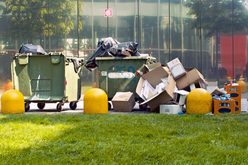 People discarding old furniture for recycling in Woolwich