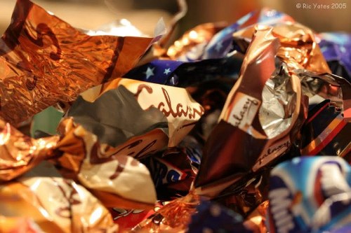 Sorted recycling bins showing paper, glass and plastics for local borough separation
